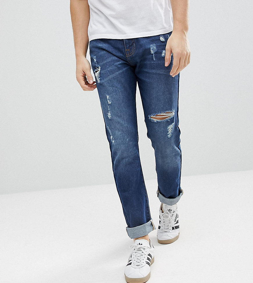 Укороченные рваные джинсы